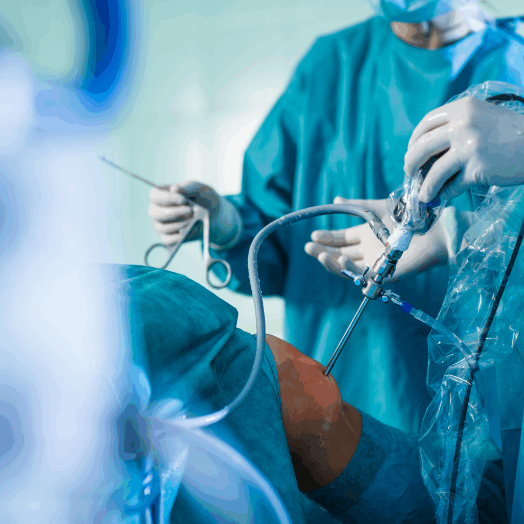 Orthopedic surgeon performing advanced knee replacement surgery with modern medical equipment in Raipur.